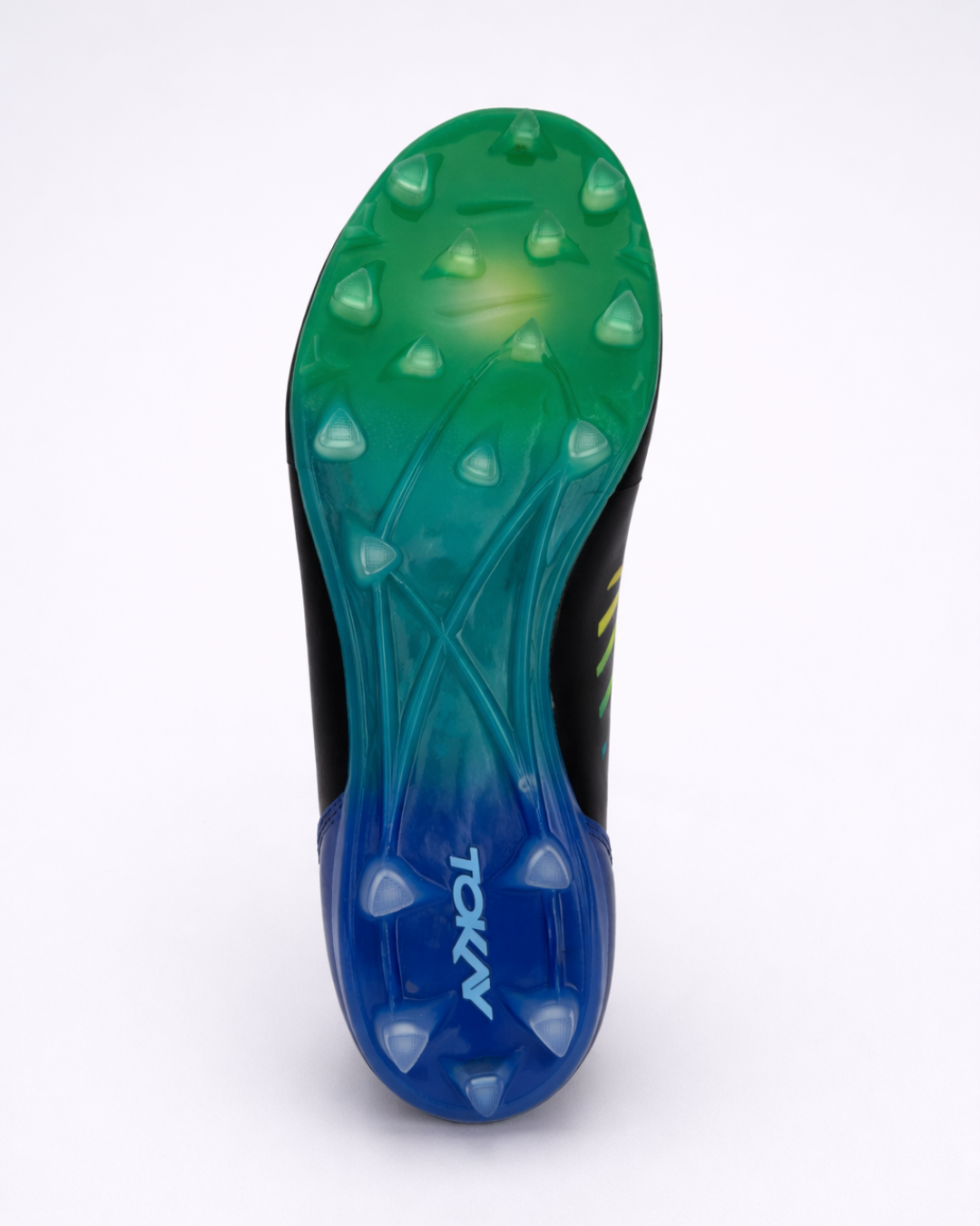 The outsole of a TOKAY Ultimate frisbee shoe, featuring a green-to-blue gradient design with studs, shown on a white background.